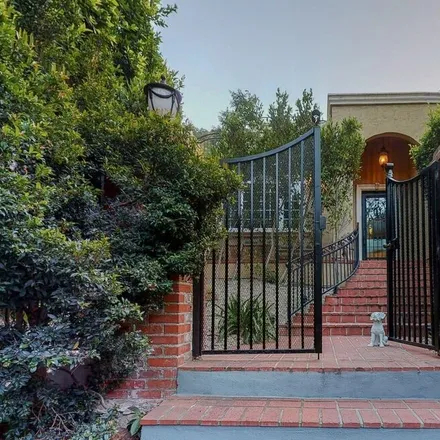 Buy this 4 bed house on 1615 Benedict Canyon Drive in Beverly Hills, CA 90210