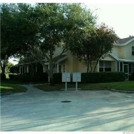 Rent this 3 bed townhouse on Pool House in Southwest Sunset Trace Circle, Palm City