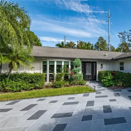 Buy this 4 bed house on 1300 Westlake Boulevard in Palm Harbor, FL 34683