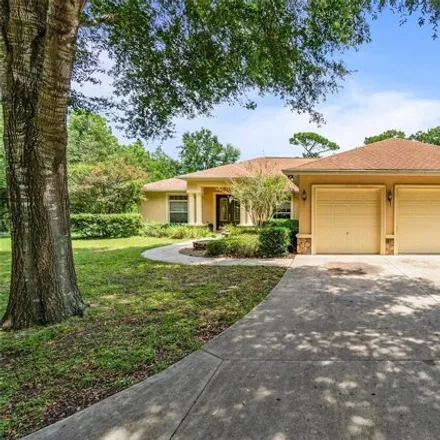 Buy this 3 bed house on 16473 Southeast 91st Court in Orange Blossom Hills, Marion County