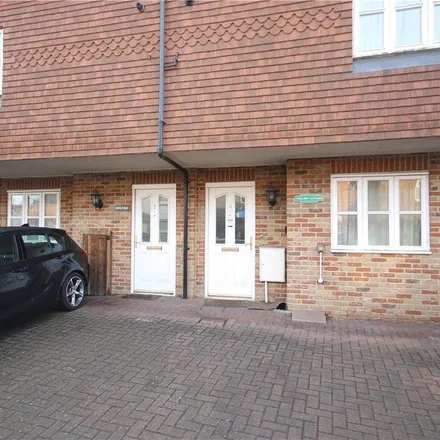 Rent this 2 bed townhouse on 3 Rusham Road in Egham, TW20 9LP