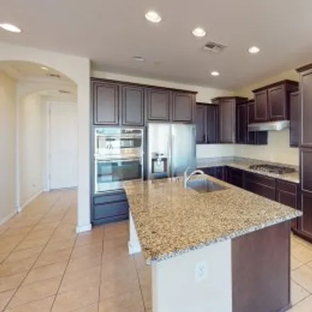 Rent this 4 bed apartment on 3458 East Mia Lane in Bridges at Gilbert, Gilbert