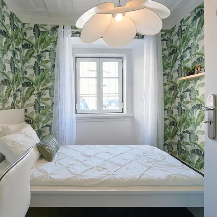 Rent this 14 bed room on Largo de Domingos Tendeiro in 1400-077 Lisbon, Portugal