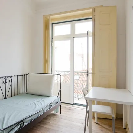 Rent this 3 bed room on Beco do Rosendo in 1100-177 Lisbon, Portugal