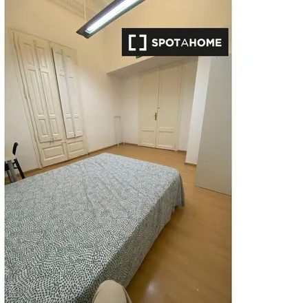 Rent this 11 bed room on Passeig de Sant Joan in 48, 08009 Barcelona