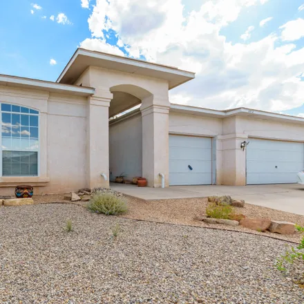 Buy this 4 bed house on 6872 Augusta Hills Drive Northeast in Rio Rancho, NM 87144