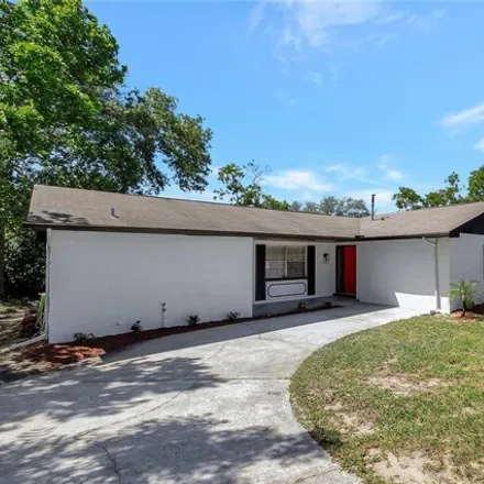 Buy this 4 bed house on 5262 Springwood Road in Spring Hill, FL 34609