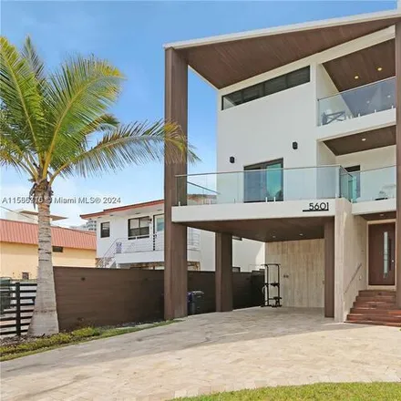 Rent this 4 bed house on 5601 N Ocean Dr