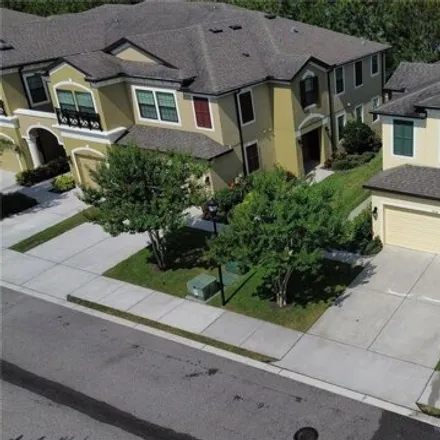 Buy this 4 bed townhouse on 9154 Fox Sparrow Road in Citrus Park, FL 33626