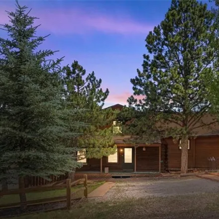Buy this 3 bed house on 581 Whispering Winds Drive in Woodland Park, CO 80863