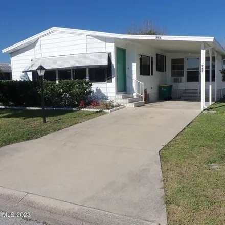 Buy this studio apartment on 976 Frangipani Drive in Brevard County, FL 32976