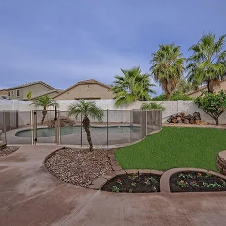 Rent this 4 bed house on 15606 West Marconi Avenue in Surprise, AZ 85374