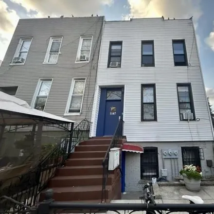 Buy this 5 bed house on 1147 Hancock Street in New York, NY 11221