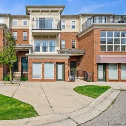 Buy this 2 bed condo on 336 Legato Drive in Walled Lake, MI 48390