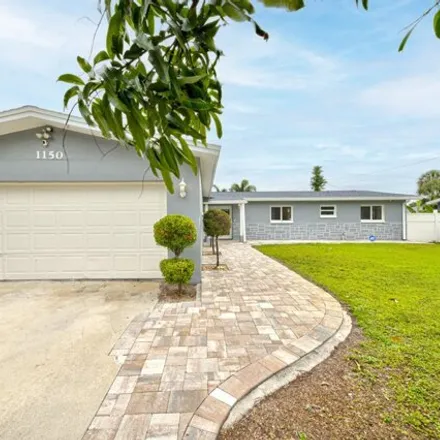 Buy this 5 bed house on 1186 Manatee Drive in Rockledge, FL 32955