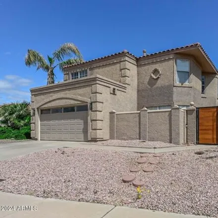 Buy this 4 bed house on 3414 East Woodland Drive in Phoenix, AZ 85048
