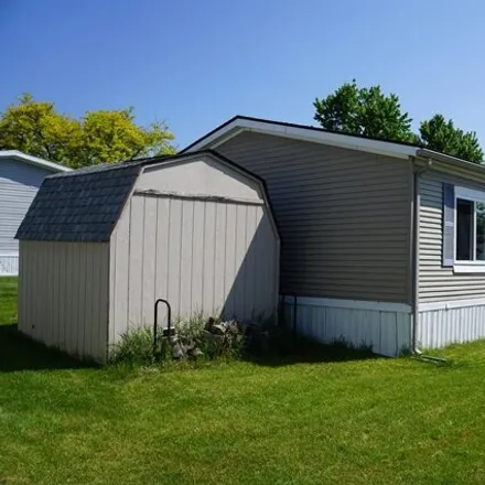 Buy this studio apartment on 2755 Mead Blvd in Highland, Michigan