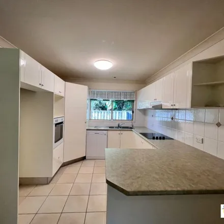 Rent this 4 bed apartment on Quest Coffee Roasters in James Street, Koala Park QLD 4220