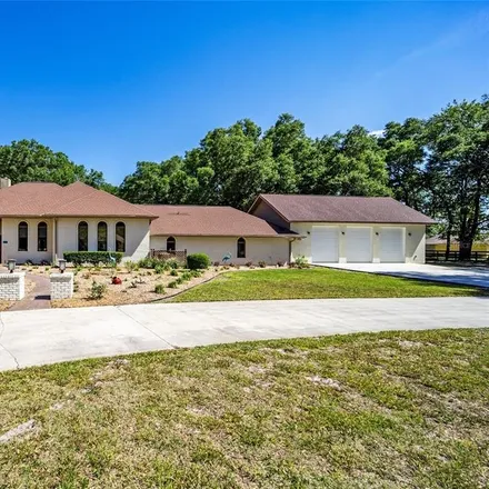 Buy this 4 bed house on 7035 Southwest 99th Street in Marion County, FL 34476