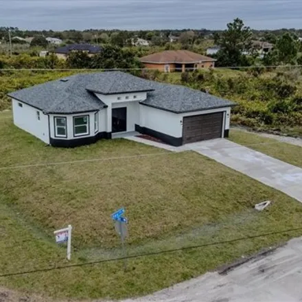 Buy this 3 bed house on 61st Street West in Lehigh Acres, FL