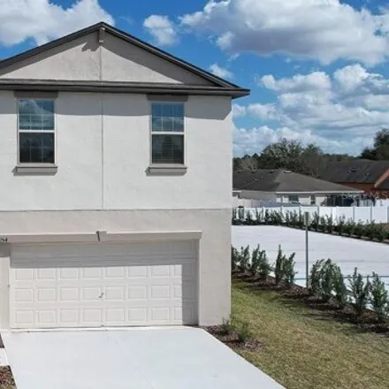 Buy this 4 bed house on Lavender Loop in Spring Hill, FL 34909