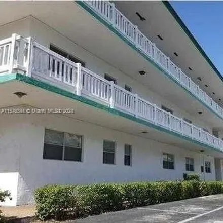 Rent this 2 bed apartment on 5845 Northwest 16th Place in Sunrise, FL 33313