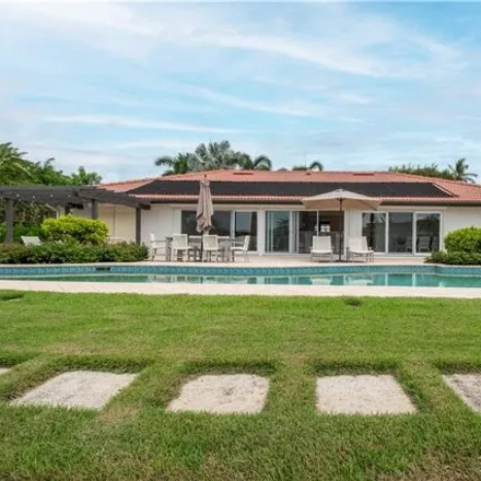 Rent this 4 bed house on 222 Bay Pt in Naples, Florida