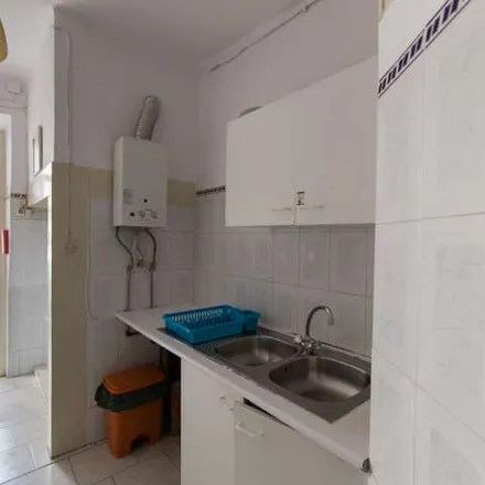 Rent this 7 bed apartment on Avenida Duque de Ávila 56 in 1000-141 Lisbon, Portugal