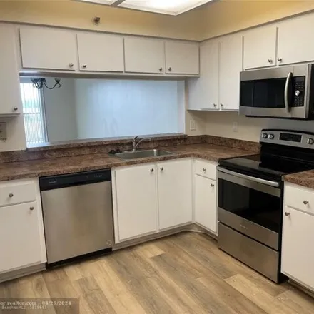 Rent this 2 bed condo on 2176 South Cypress Bend Drive in Pompano Beach, FL 33069