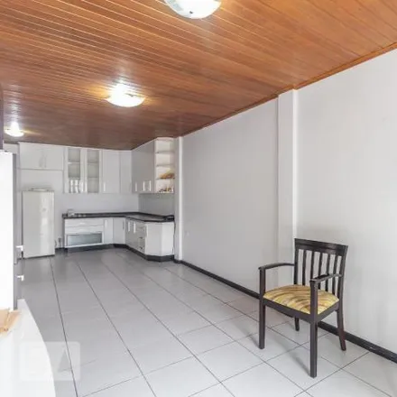 Rent this 4 bed house on Rua Brasílio Ribas 506 in Novo Mundo, Curitiba - PR