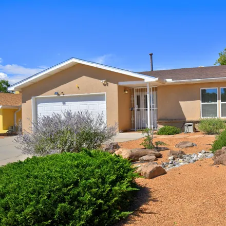 Buy this 3 bed house on 12221 Claremont Avenue Northeast in Enchanted Park, Albuquerque