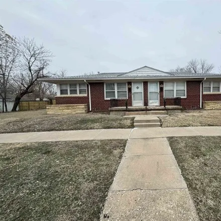 Buy this 4 bed house on JumpStart in 895 East Lincoln Street, Wichita