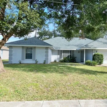 Rent this 3 bed house on 731 Red Coach Avenue in Deltona, FL 32725