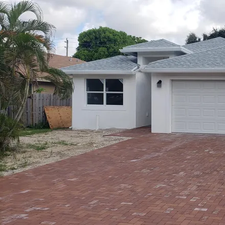 Buy this 4 bed house on 4343 Vicliff Road in Palm Springs, FL 33406