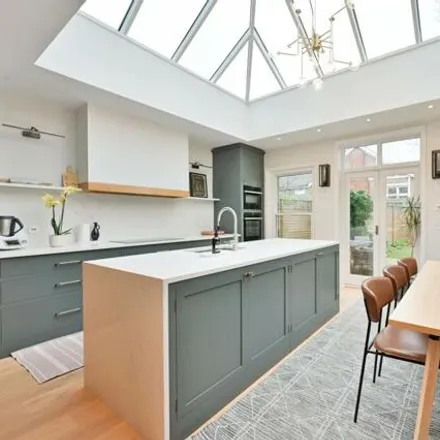 Image 3 - 28 Southdean Gardens, London, SW19 6NU, United Kingdom - Townhouse for rent