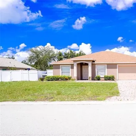 Buy this 4 bed house on 312 Majestic Gardens Drive in Polk County, FL 33880