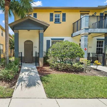 Buy this 3 bed townhouse on 1980 Southeast High Springs Drive in Port Saint Lucie, FL 34952