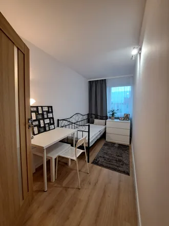 Rent this 4 bed room on Wiejska 62 in 15-352 Białystok, Poland
