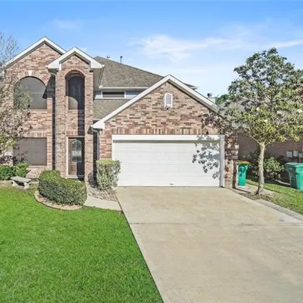 Buy this 4 bed house on 7506 The Lakes Drive in Conroe, TX 77304