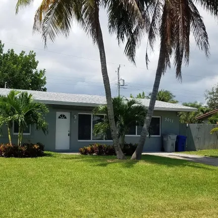 Rent this 4 bed house on 3011 Northeast 11th Avenue in Cresthaven, Pompano Beach