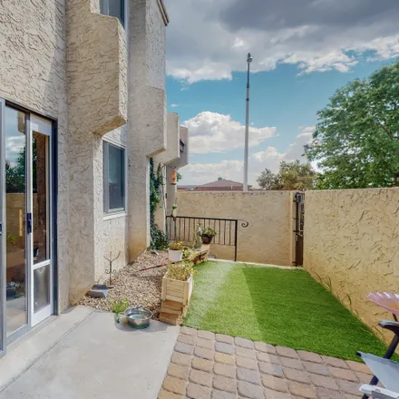 Buy this 2 bed townhouse on 10124 Gutierrez Road Northeast in Oso Grande, Albuquerque