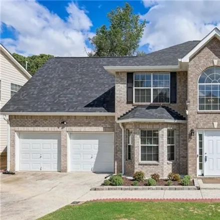 Buy this 4 bed house on 4937 Lily Stem Drive in Gwinnett County, GA 30011