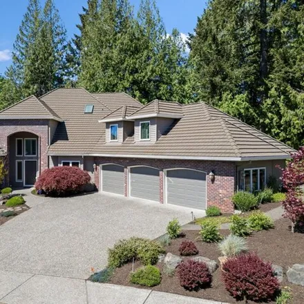 Buy this 4 bed house on 12465 Northwest Woodland Court in Portland, OR 97229