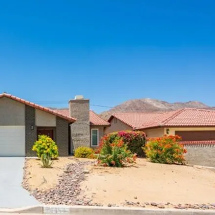 Rent this 3 bed house on 54639 Avenida Ramirez in La Quinta, CA 92253