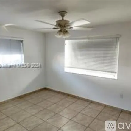 Rent this 3 bed house on 8645 SW 47th Terrace