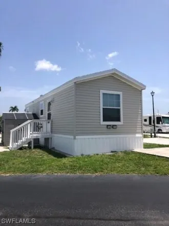Buy this studio apartment on 11633 Dawn Cowrie Drive in Iona, FL 33908