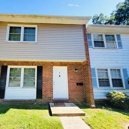 Buy this 3 bed townhouse on 406 Savage Drive in Warwick Lawns, VA 23602
