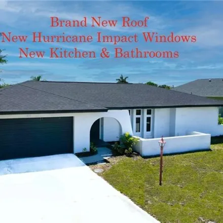 Buy this 3 bed house on 908 Southeast 33rd Street in Cape Coral, FL 33904