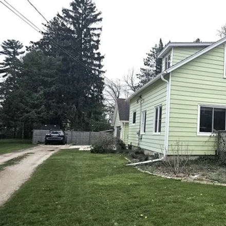 Buy this 4 bed house on 251 West Page Street in Elkhorn, WI 53121