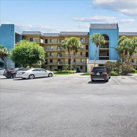 Buy this 3 bed condo on Tennis Club Drive in Schall Circle, Palm Beach County